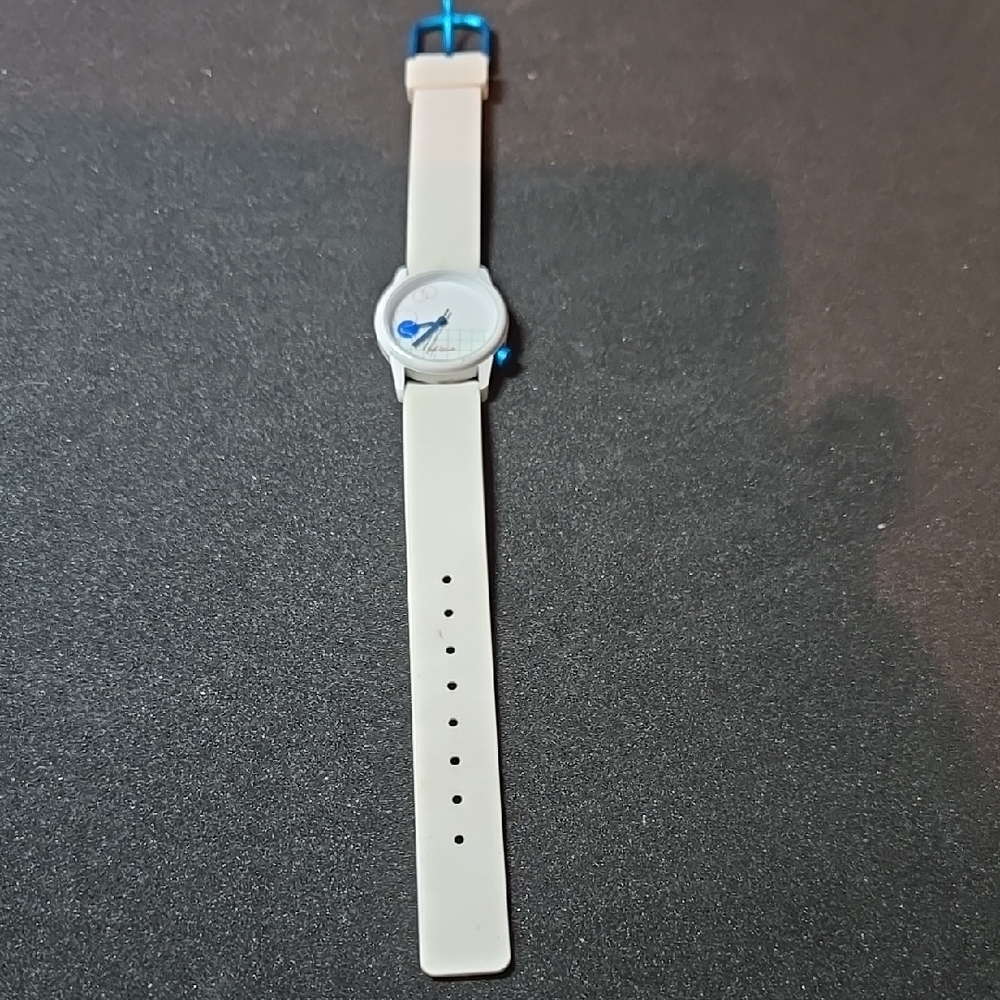 Vintage White and Blue Watch with Circular Face and Silicone Strap